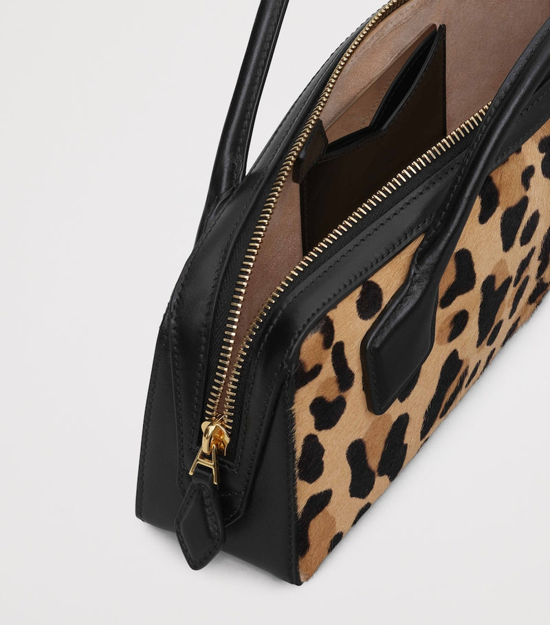 Alaïa Le Teckel leopard print clutch bag, imported from the UK