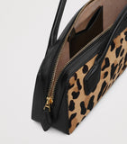 Alaïa Le Teckel leopard print clutch bag, imported from the UK