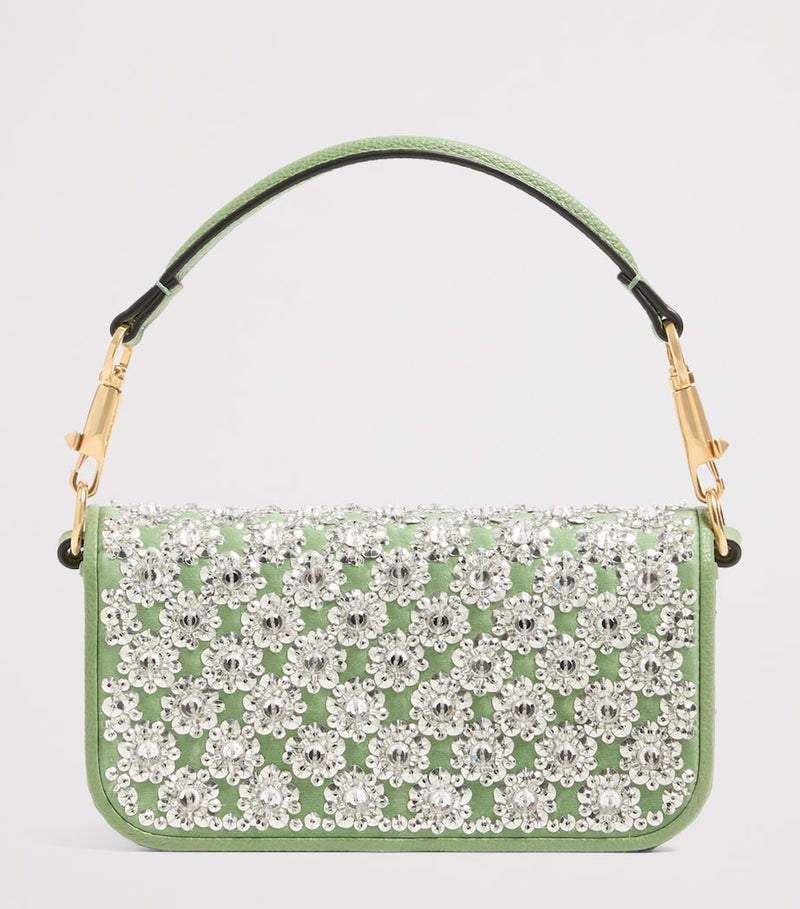 Valentino Garavani small Locò embellished shoulder bag, imported from the UK