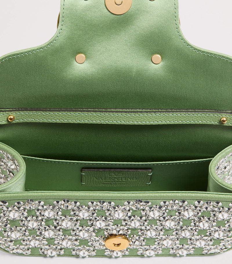 Valentino Garavani small Locò embellished shoulder bag, imported from the UK