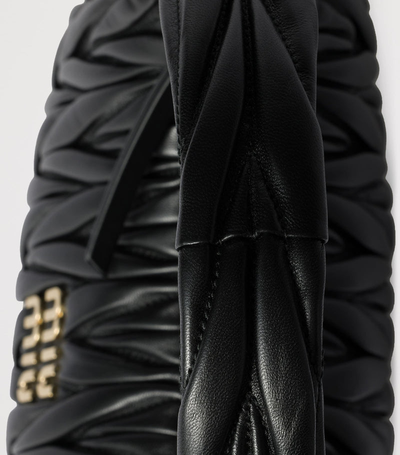 Miu Miu matelassé leather Wander top-handle bag (British brand)