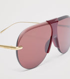 LOEWE aviator sunglasses with red tint and steel frame, imported from the UK
