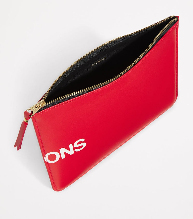 Comme des Garçons large leather logo pouch, UK version