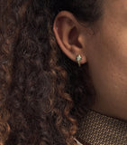 Jacquie Aiche yellow gold snake huggie earring with diamond and emerald, UK version