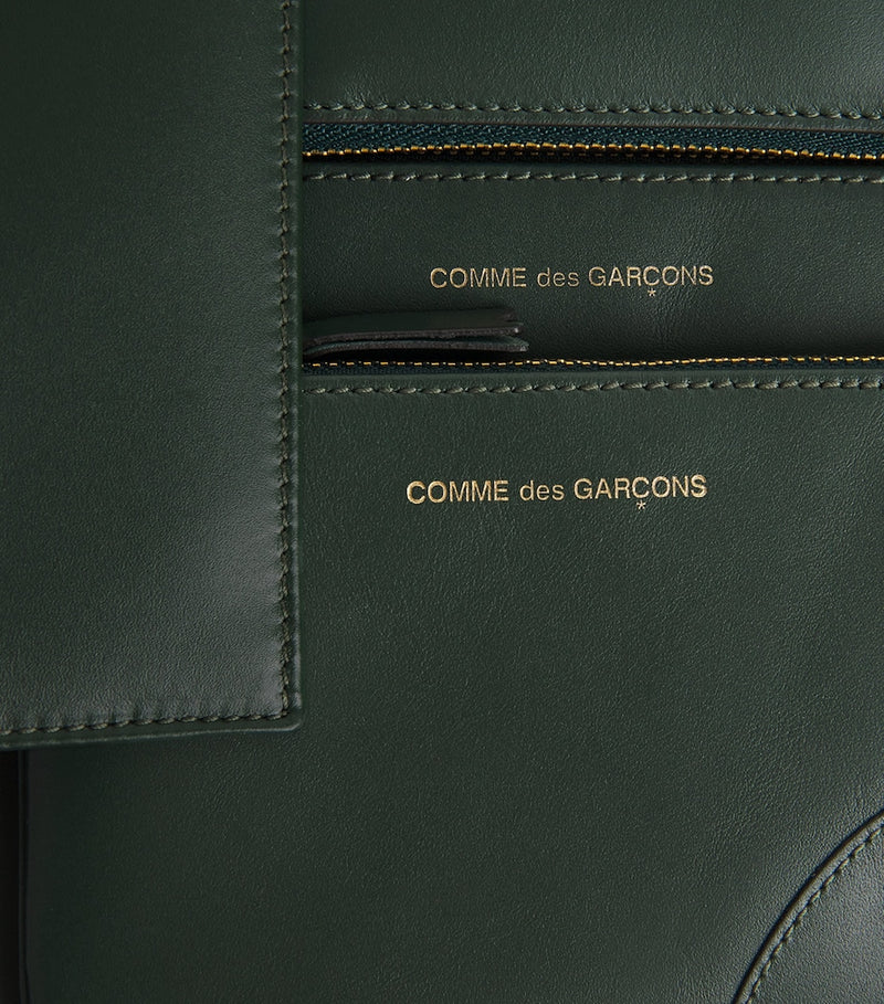 Comme des Garçons Wallet small leather pouch, UK version