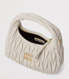 Miu Miu Wander matelassé leather handbag 17x20x6cm (British brand)