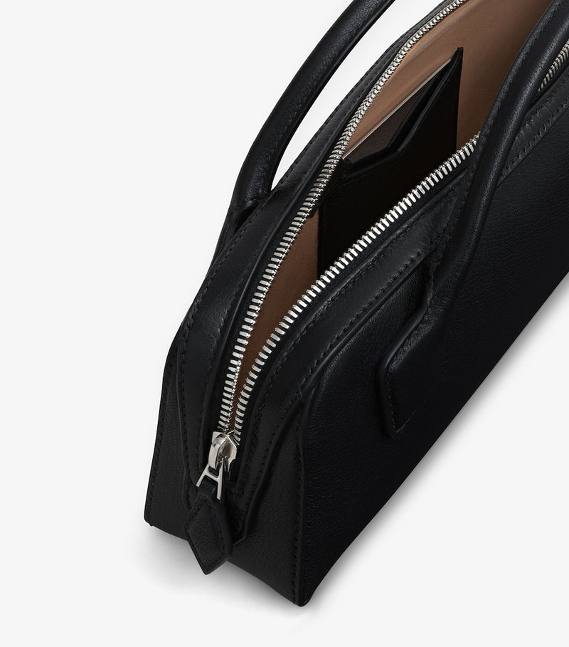 Alaïa Le Teckel top-handle bag in small frame (British brand)