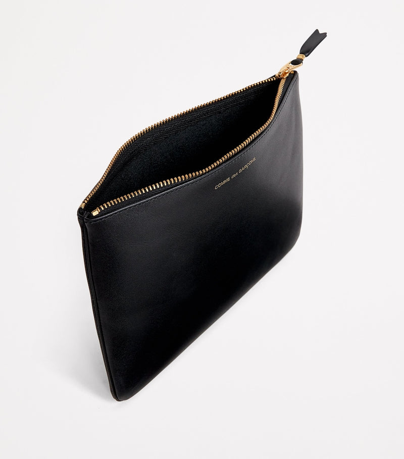Comme des Garçons large leather zipped pouch - British product