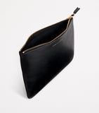Comme des Garçons large leather zipped pouch - British product