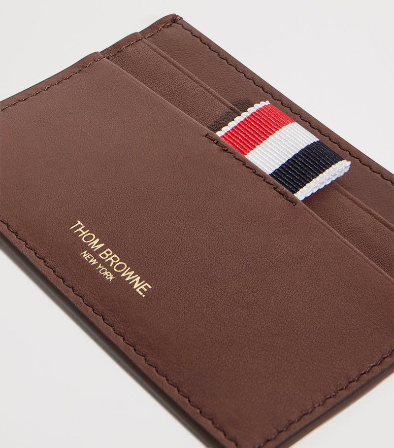 Thom Browne leather card holder with tricolour stripe, imported from the UK