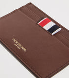 Thom Browne leather card holder with tricolour stripe, imported from the UK