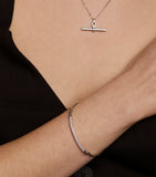 Astrid & Miyu pavé knot bangle, imported from the UK