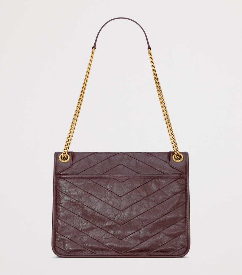 Saint Laurent Niki medium leather shoulder bag, British product