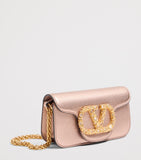 Valentino Garavani Small Leather Locò shoulder bag, imported from the UK