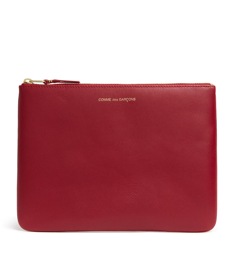 Comme des Garçons large leather zipped pouch - British product