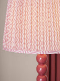 Red Bobbin floor lamp with painted wood effect and fabric shade, UK version
