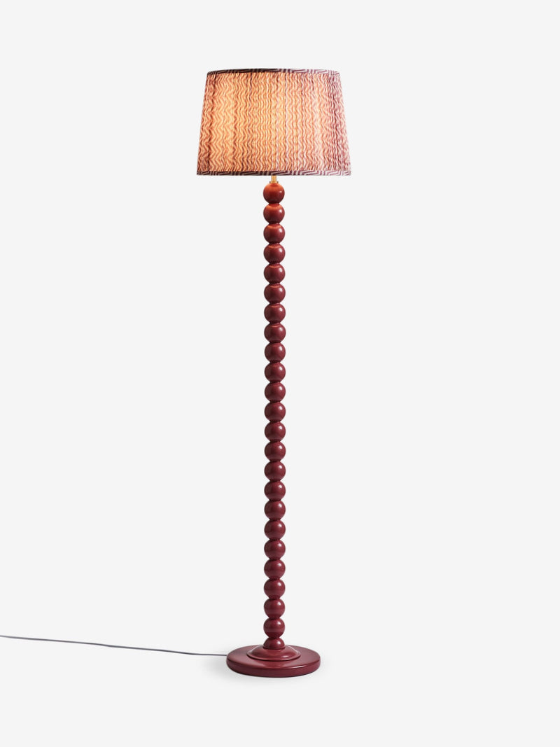 Red Bobbin floor lamp with painted wood effect and fabric shade, UK version
