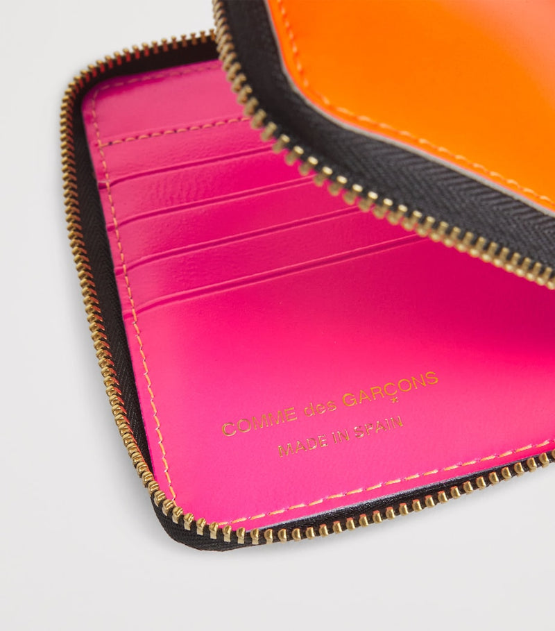 Comme des Garçons Wallet Super Fluo medium leather wallet (British brand)