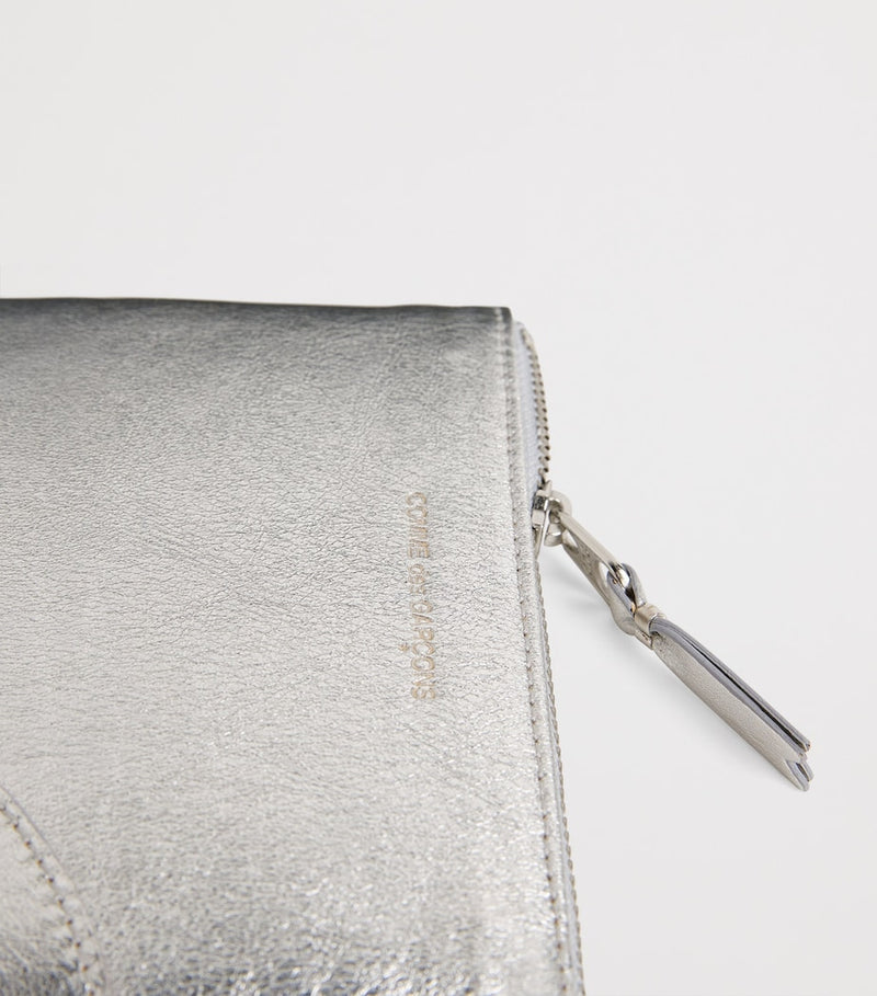 Comme Des Garçons Wallet small leather pouch silver, UK version