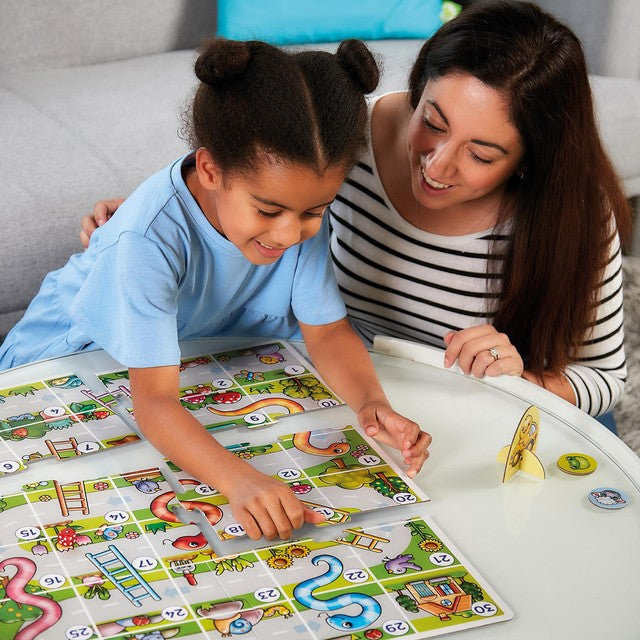 Orchard Toys Snakes and Ladders board game, imported from the UK