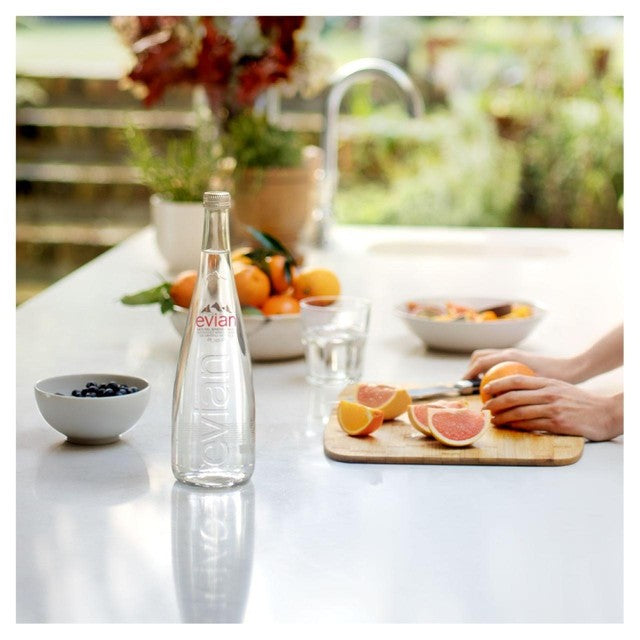 Evian still mineral water 750ml glass bottle - British product