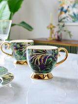 Next Clarke & Clarke Set of 2 Indigo Blue/Gold Monkey Business Footed Fine China Mugs- Buy online at McGrocer