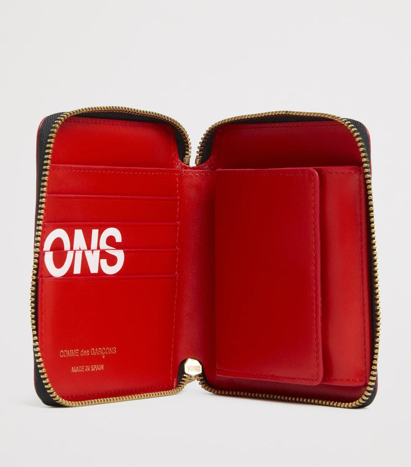 Comme des Garçons extra large logo zipped wallet, UK version