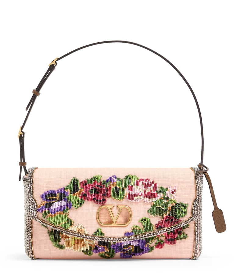 Valentino Garavani small beaded DeVain shoulder bag, imported from the UK