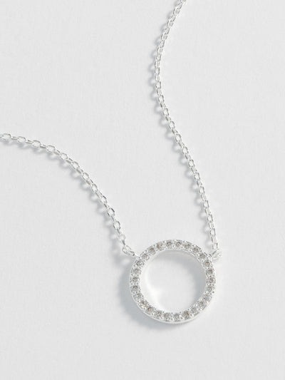 Next Estella Bartlett Silver Large Pave Set Circle CZ Necklace- Buy online at McGrocer
