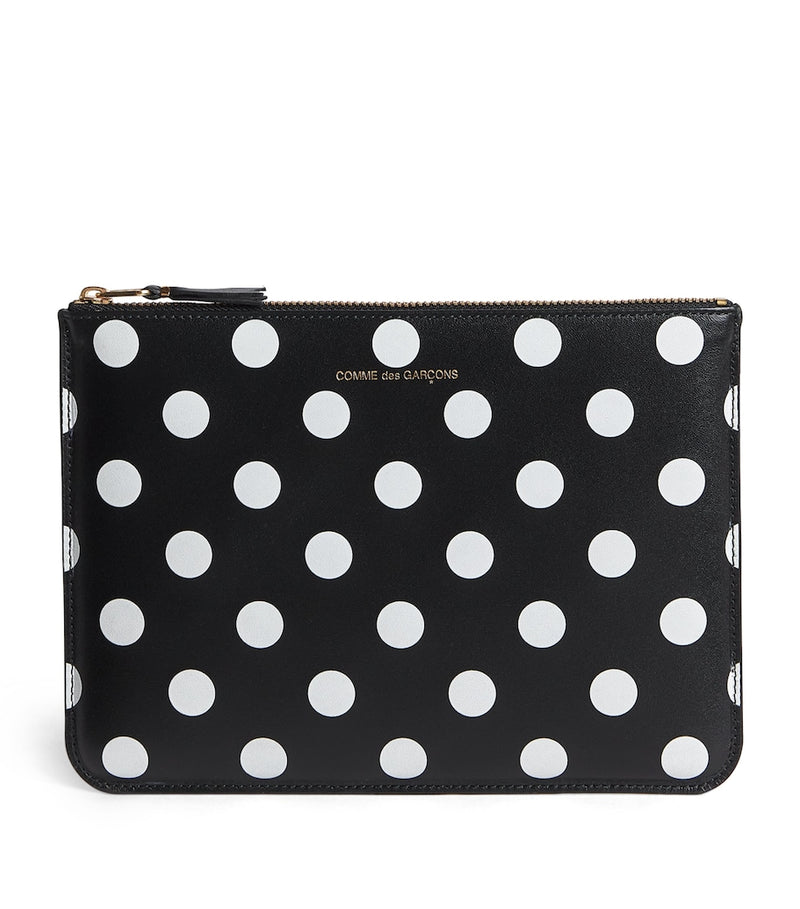 Comme Des Garçons large leather polka-dot zipped pouch, imported from the UK