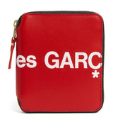 Harrods Comme Des Garçons Extra Large Logo Zipped Wallet- Buy online at McGrocer