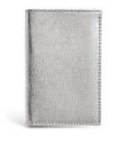 Comme des Garçons vertical bifold card holder with gold accents, imported from the UK