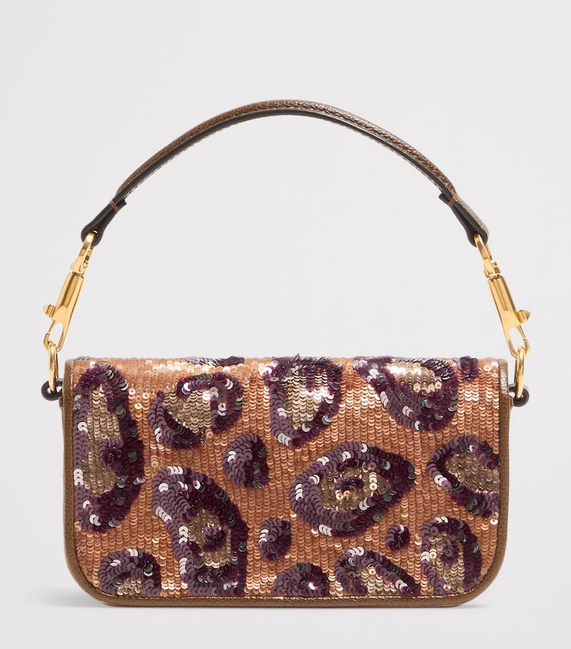 Valentino Garavani small embellished Locò shoulder bag, imported from the UK