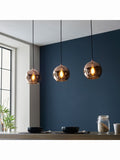 Gallery Home Copper Bali pendant light mirrored glass shades, imported from the UK