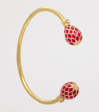 Halcyon Days gold-plated Agama torque bracelet, imported from the UK