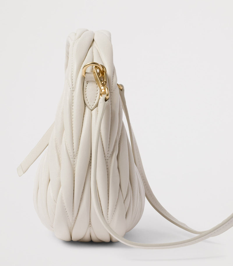 Miu Miu Wander matelassé leather top-handle bag (British brand)
