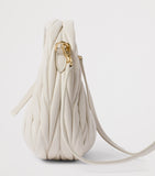 Miu Miu Wander matelassé leather top-handle bag (British brand)