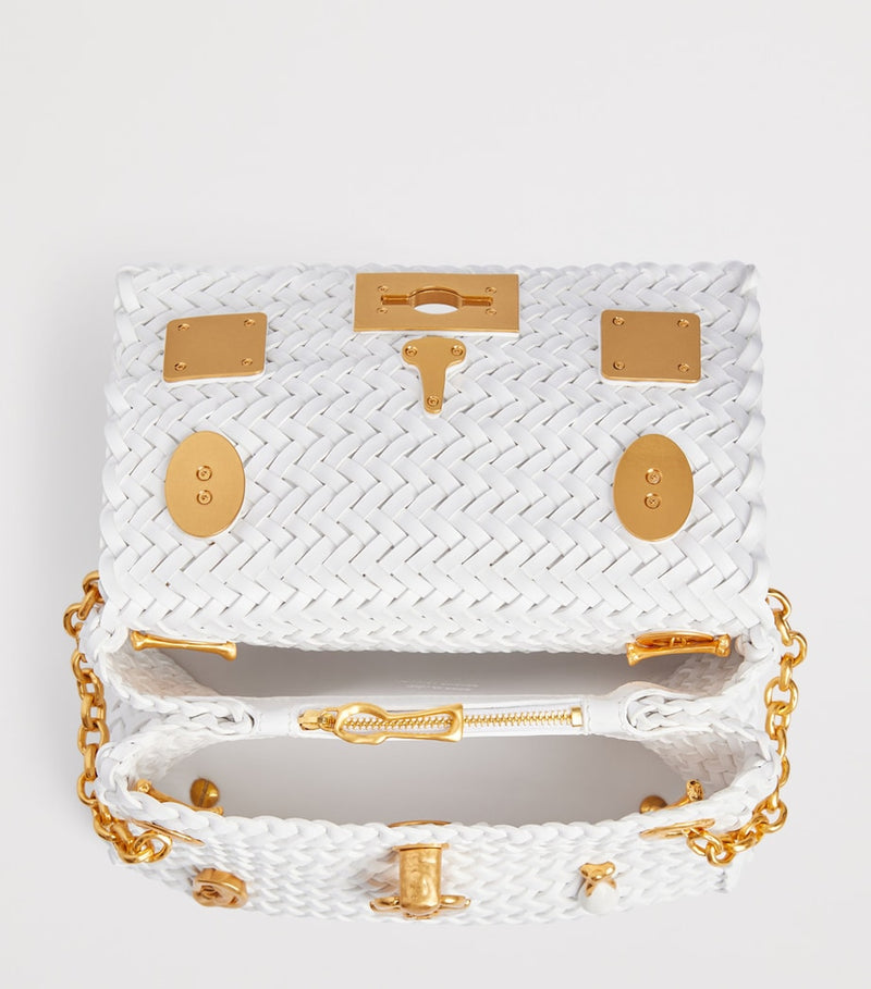 Schiaparelli mini calfskin bijoux secret top-handle bag, imported from the UK