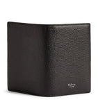 Mulberry grained leather passport holder with slimline design, imported from the UK