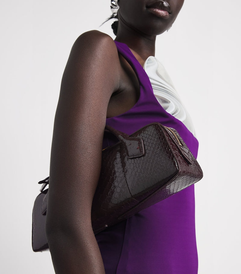 Alaïa snakeskin Le Teckel top-handle bag, imported from the UK