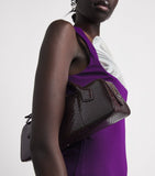 Alaïa snakeskin Le Teckel top-handle bag, imported from the UK