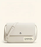 McQueen leather shoulder bag with skull flower clasp, imported from the UK