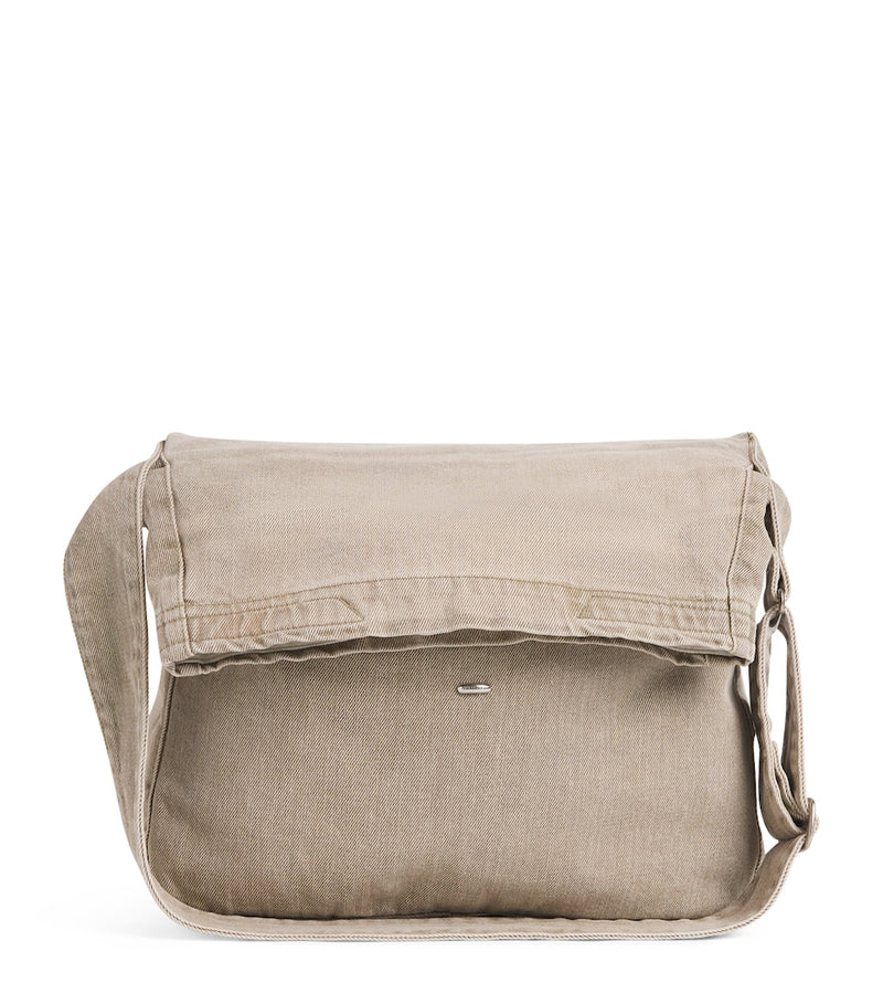 Our Legacy denim sling shoulder bag with mineral pigment, imported from the UK