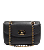 Valentino Garavani Djuna lambskin shoulder bag with gold VLOGO hardware, UK version