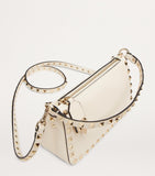 Valentino Garavani small leather Rockstud shoulder bag (British brand)