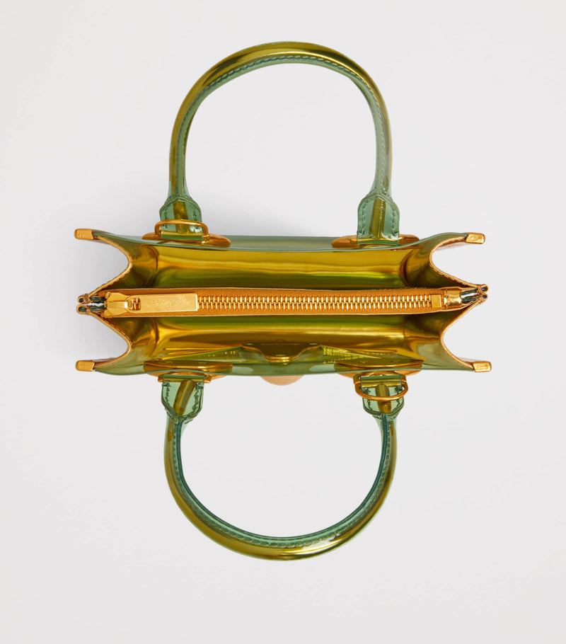 Schiaparelli vinyl face top-handle bag with gold-tone frame (British brand)