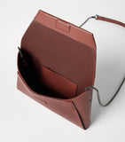 Brunello Cucinelli leather BC Pochette clutch bag, imported from the UK