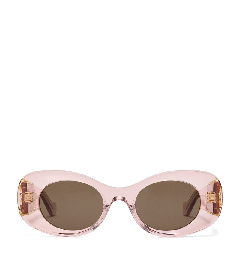 LOEWE oval sunglasses with bevelled acetate frame, imported from the UK