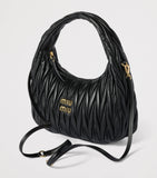 Miu Miu matelassé leather Wander top-handle bag (British brand)