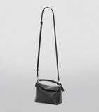 LOEWE mini Puzzle Edge top-handle bag in calfskin, imported from the UK